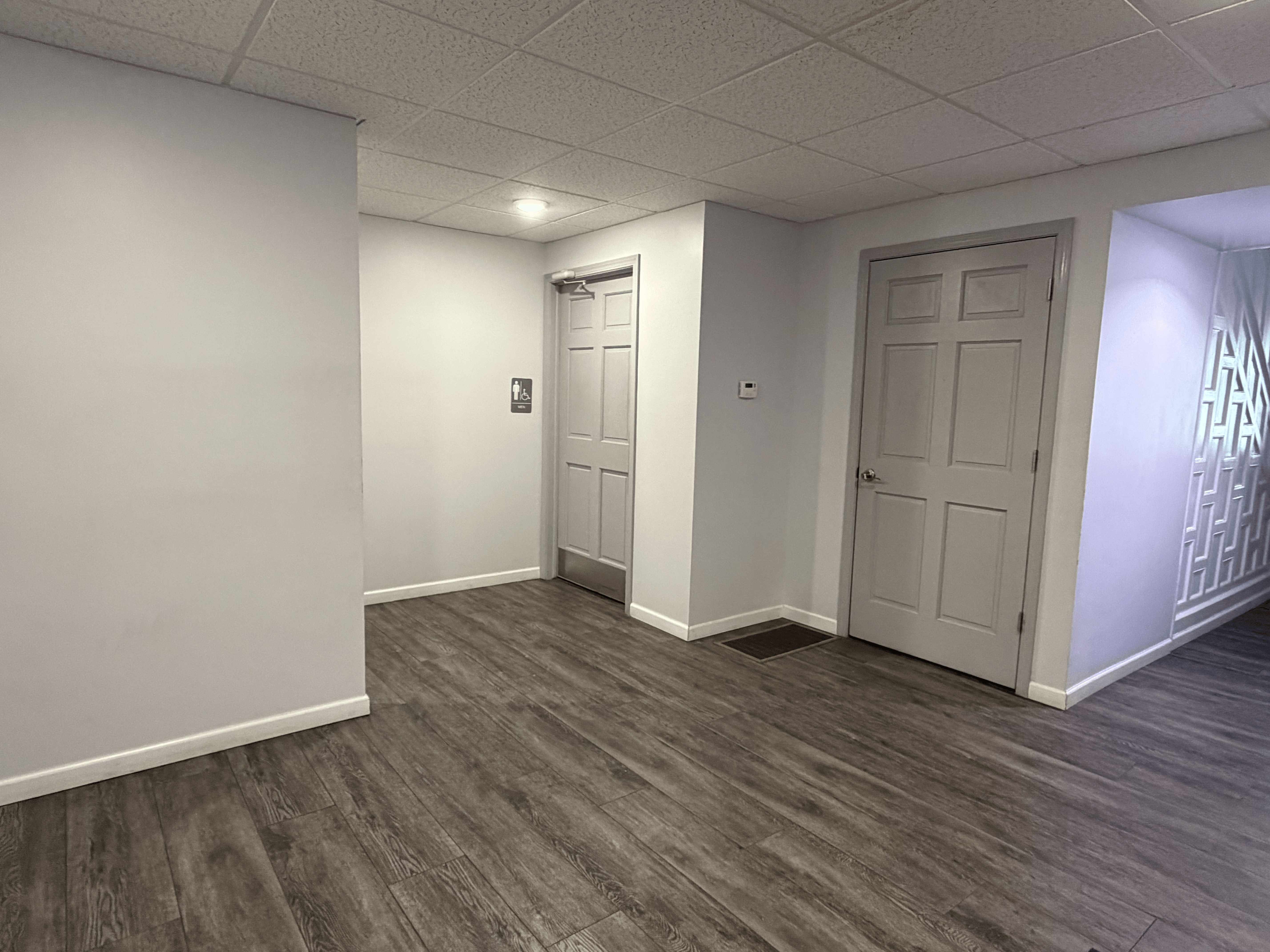 Interior corridor with ADA-accessible restrooms